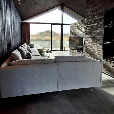 Dom wakacyjny Architectural Peach And Minimalism In The Dunes *